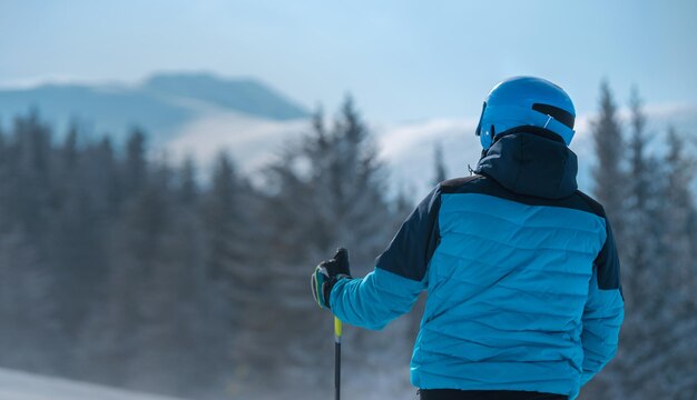 man-enjoying-his-free-time-mountain-resort-skiing-concept-best-sport_704724-288